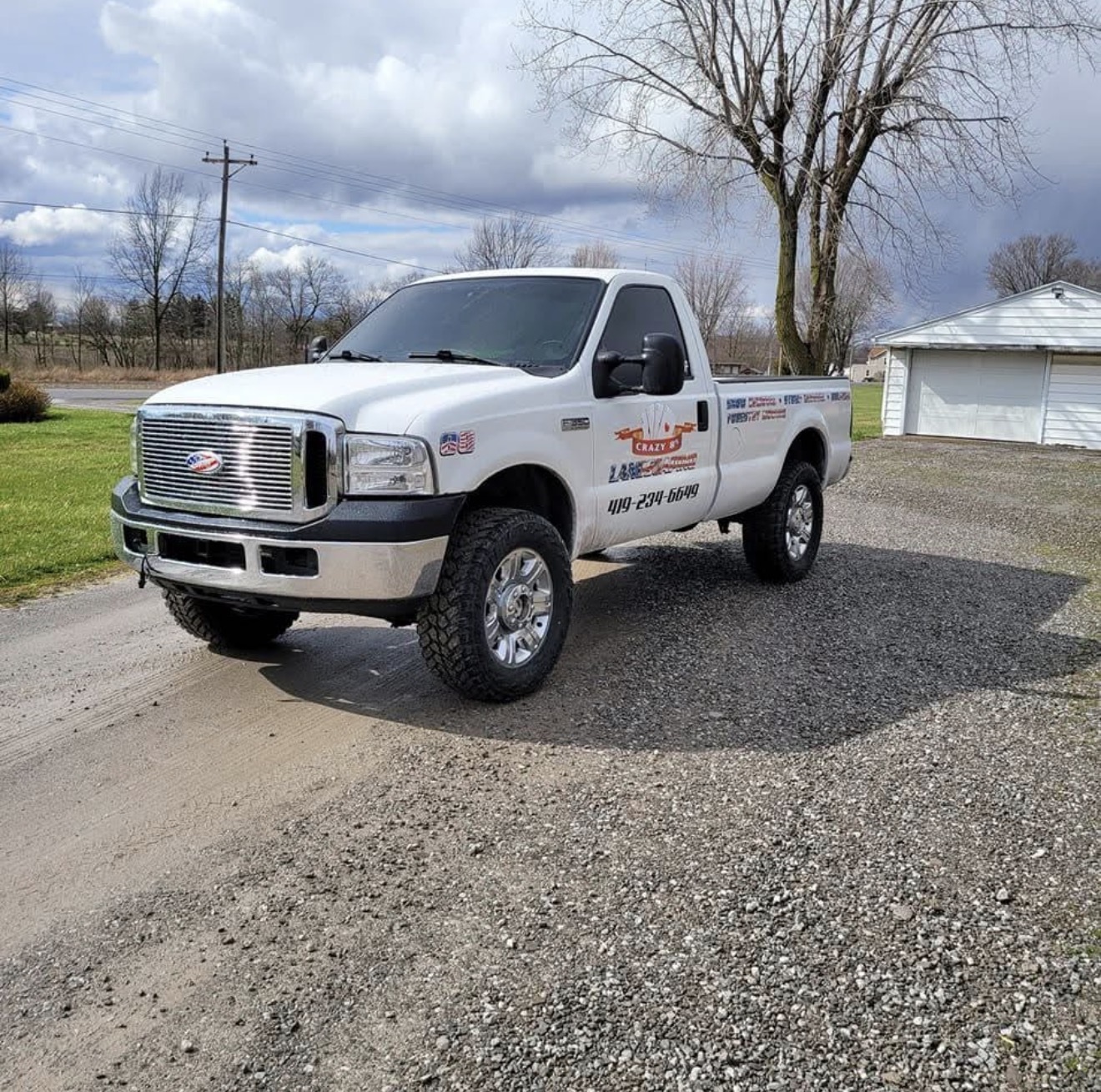 Crazy 8's Landscaping lettered Ford Super Duty work truck